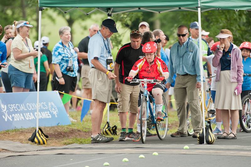 Desiree Holland brought home a gold medal for 10k Cycling Time Trials in the USA Special Olympics this past June. Pictured with coach Chris Militello from Arrow Bicycle. Photo courtesy marleenvandenneste.com
