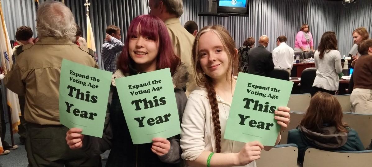Harper (left) and Maria (right), a junior and student activist at Northwestern High School came to the public hearing to speak in favor of lowering the city voting age to 16 years old. Photo courtesy Rebecca Bennett.