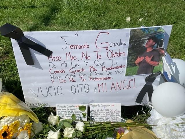 A handmade sign with a quote from Proverbs 3 decorates the site of the crash where a motorcyclist was killed. Courtesy of Mary Cook.