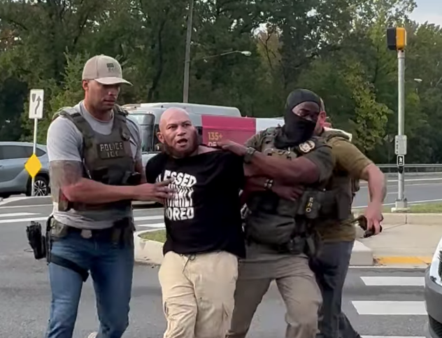 ICE agents arrest Job Arias-Mendoza in Hyattsville in September.  Screenshot from video by Raphi Talisman