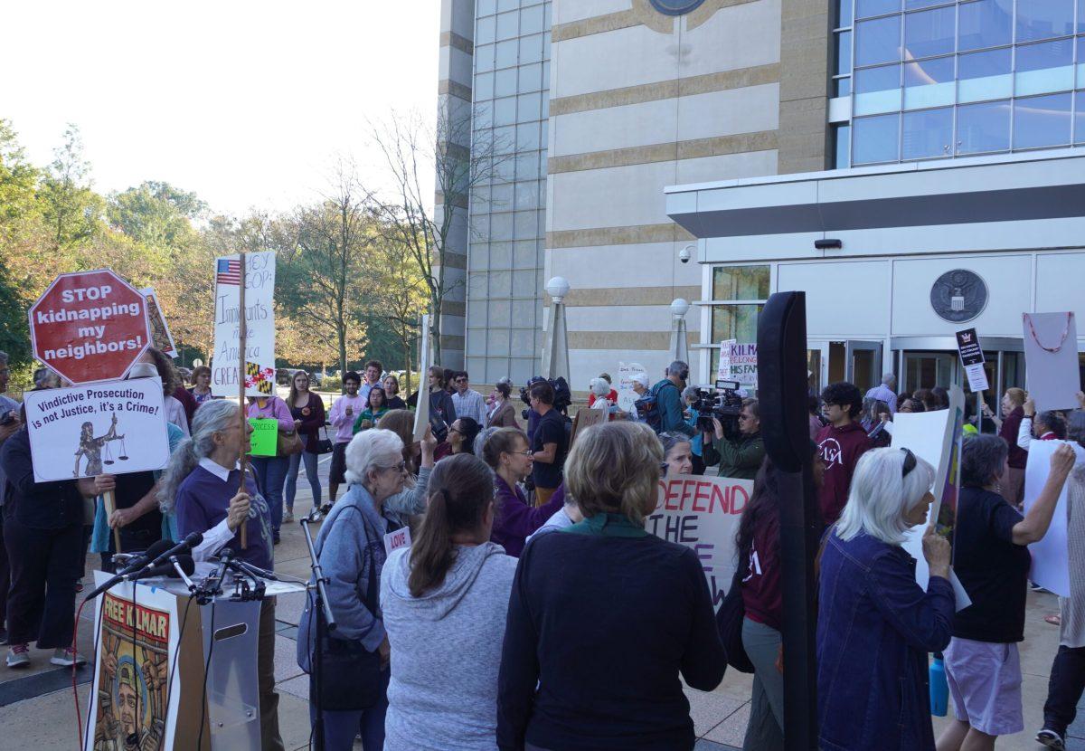 After a rally led by the immigrant abvocacy group CASA concludes, rallygoers chant and walk in a circle in support of Kilmar Abrego Garcia, on Oct. 6, 2025. (Photo by William J. Ford/Maryland Matters)