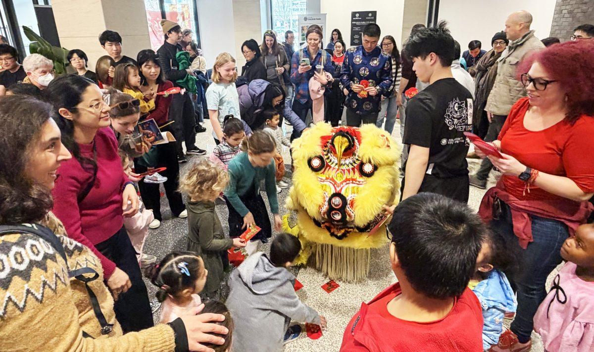 More than 100 people gathered at City Hall on Saturday to celebrate Lunar New Year. Photo by JALEN WADE

