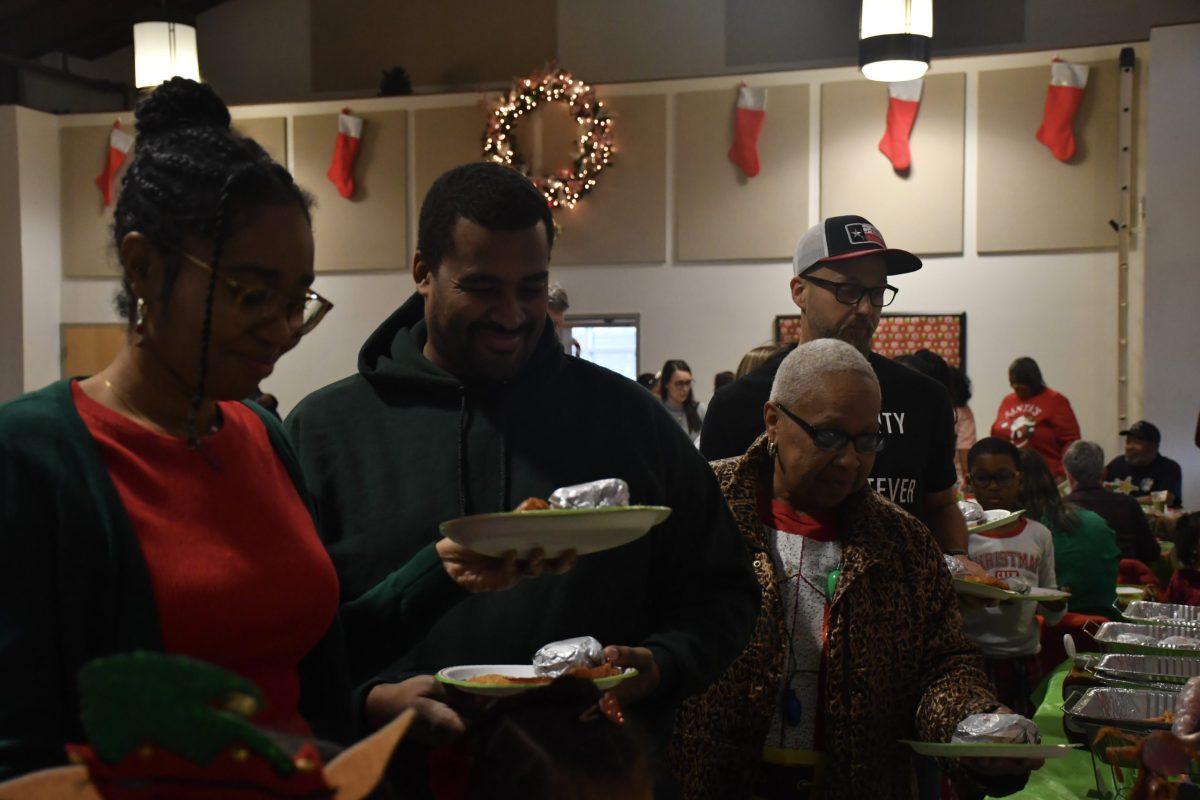 A potluck line in Laurel.