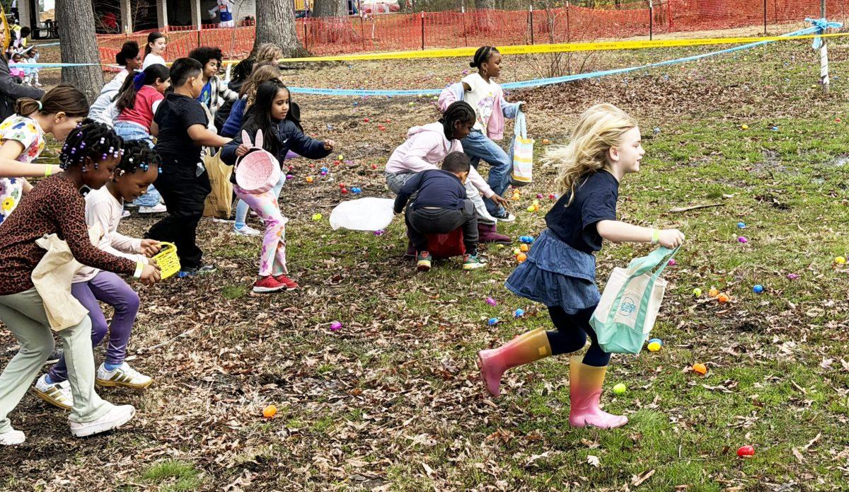 Children race to find candy-filled plastic Easter eggs during the city’s Egg-Stravaganza on March 21. Photo by JALEN WADE