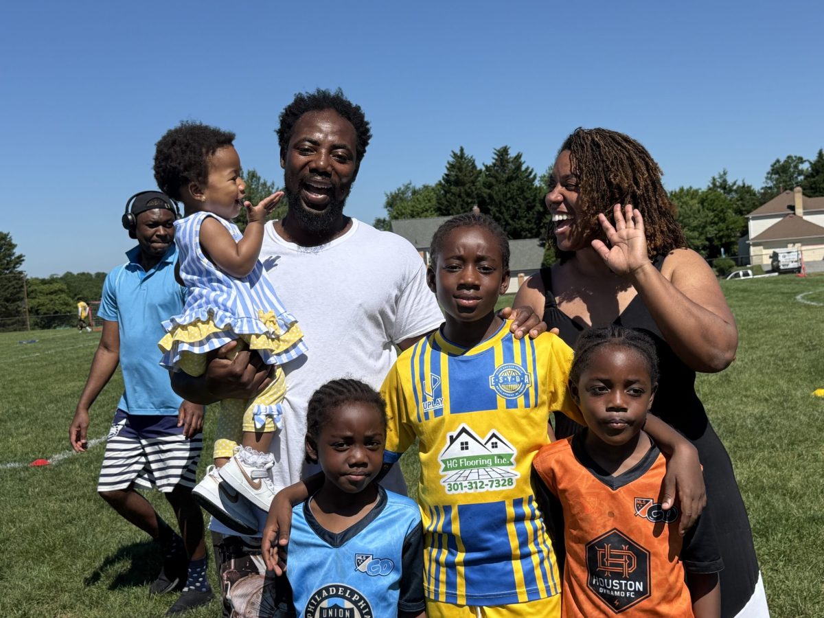 Ghana native Justice Sakyi with his family of soccer players.