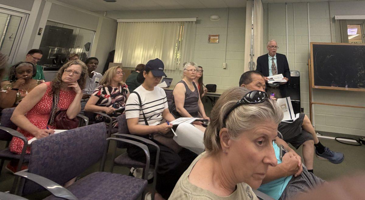 About 40 residents met to offer feedback to the developer who plans to build a 243-unit apartment building on Route 1. Photo by JALEN WADE