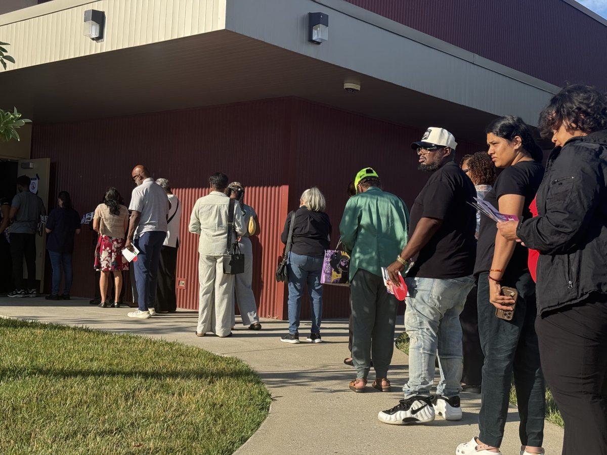 Voters wait in line outside the Laurel-Beltsville Senior Activity Center shortly before polls closed at 8 p.m. Tuesday during Maryland's primary election.