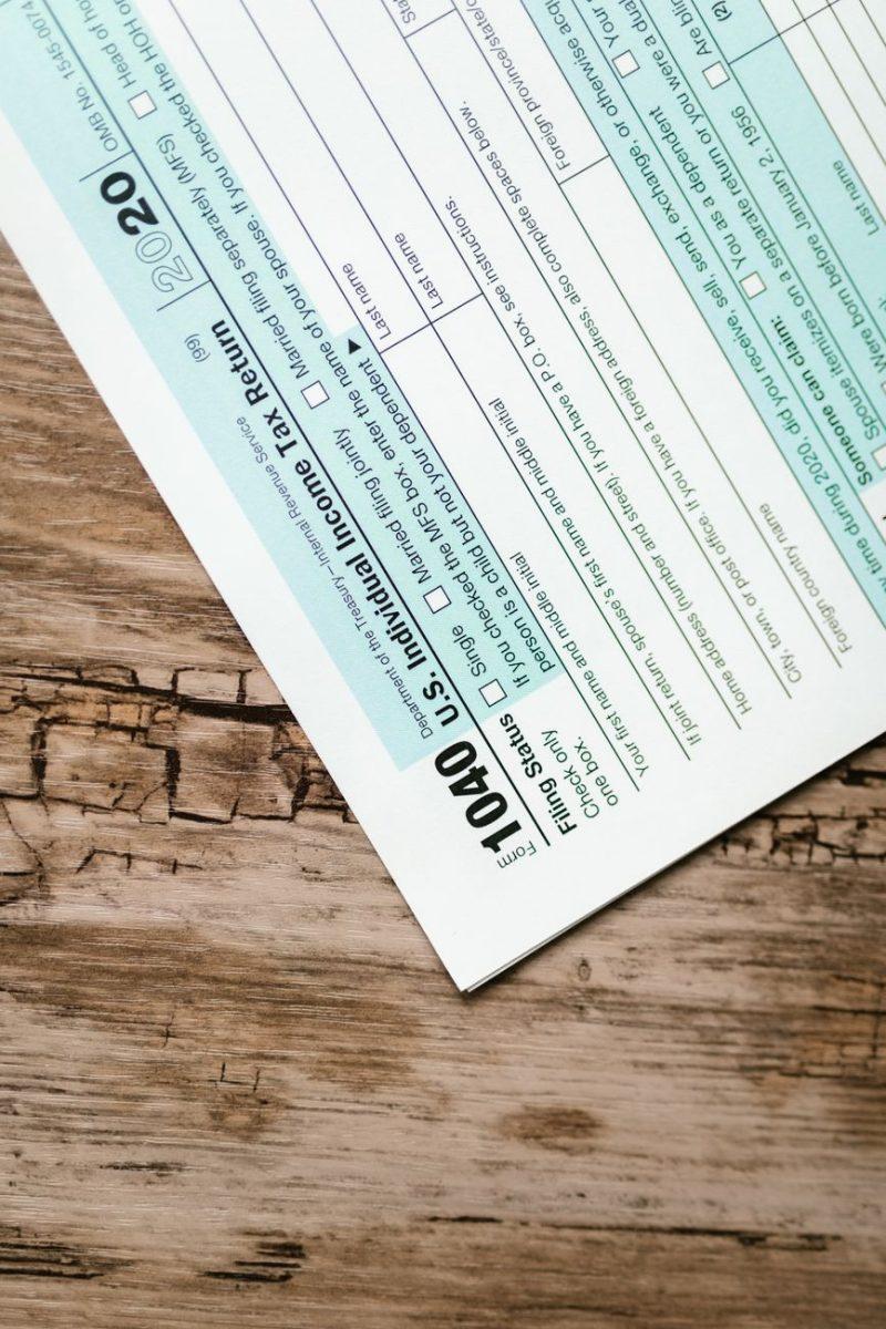 tax form on wooden surface
